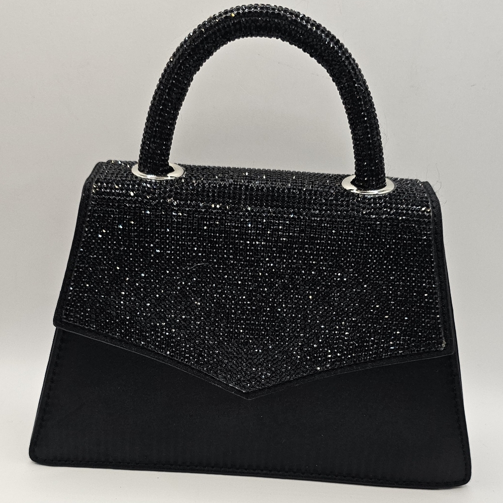 Fashion Nova Purse (clutch) black in color